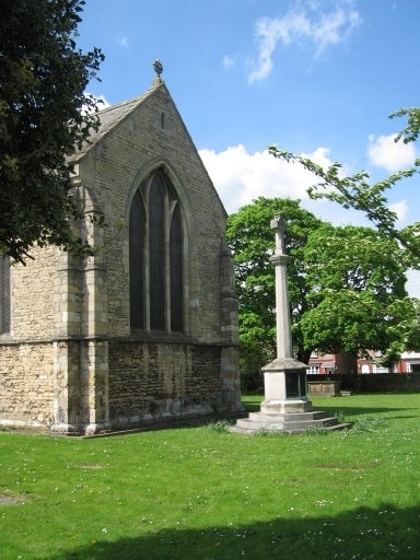 Town war memorial outside the east window